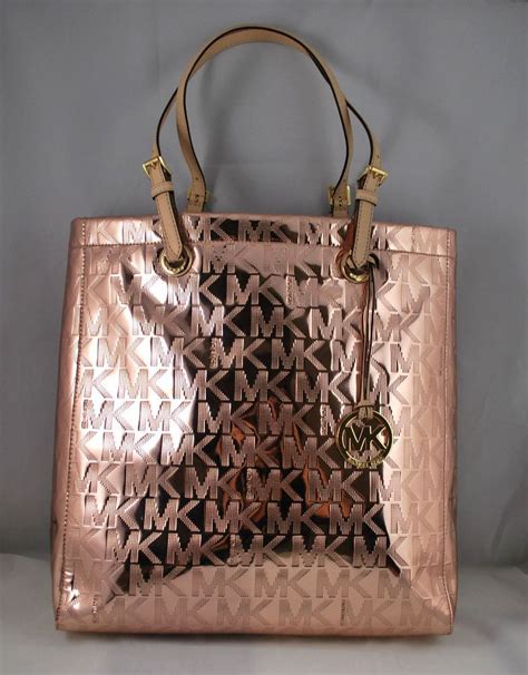 michael kors bag rose gold|Michael Kors large gold tote.